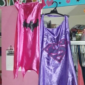 Batgirl and supergirl capes